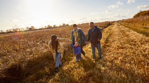 A group walking in Wicken Fen, Cambridgeshire